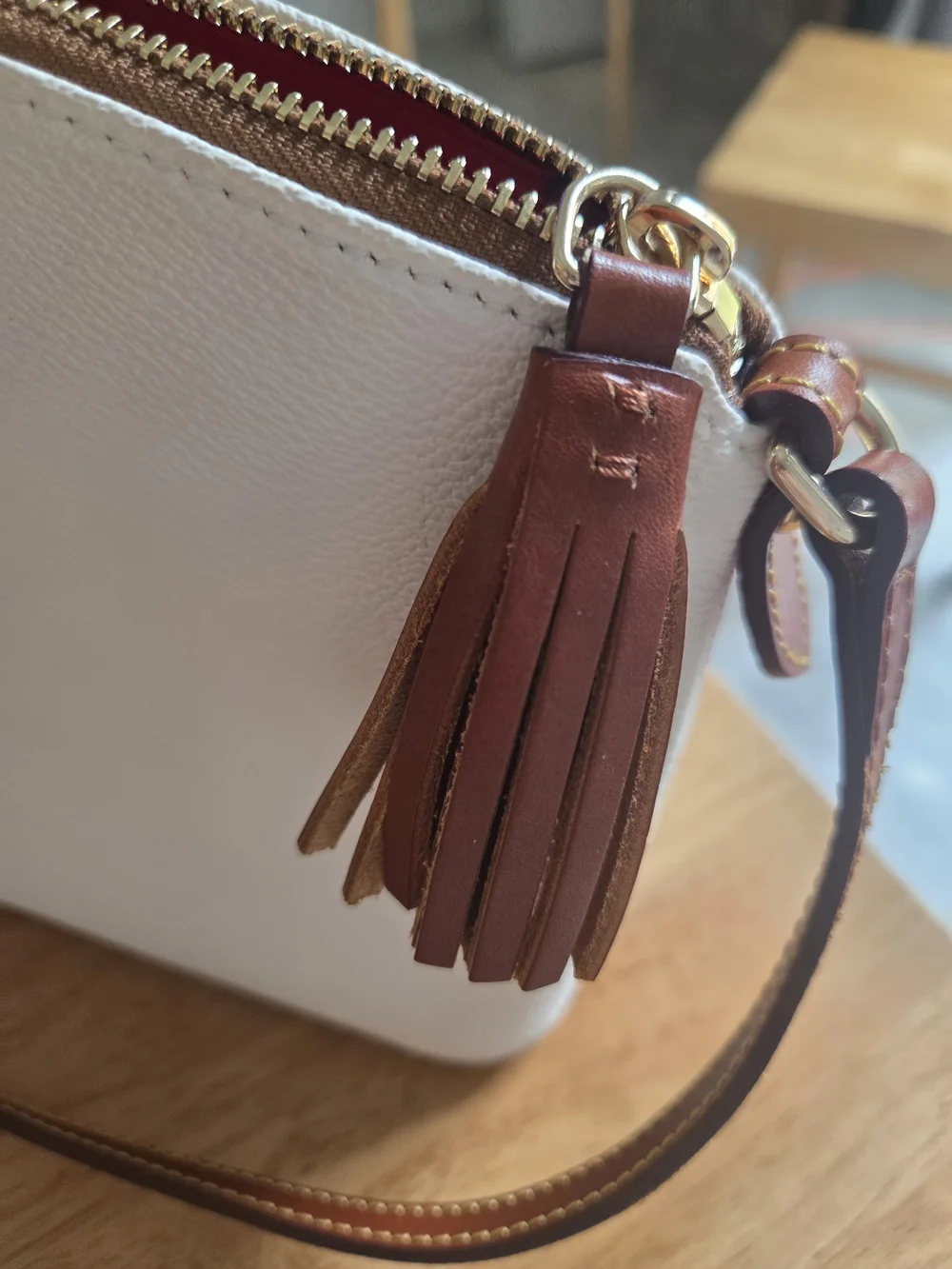Dooney & Bourke White Crossbody Bag with Brown Trim